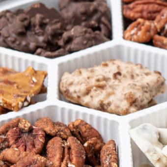 multiple nut house pecan candies in a sampler tin