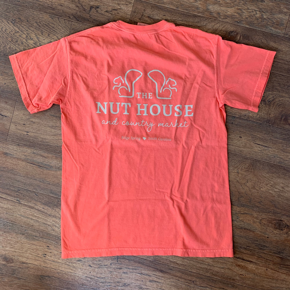 back of pink shirt with nut house logo